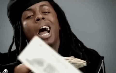 A rapper throwing money like it's nothing